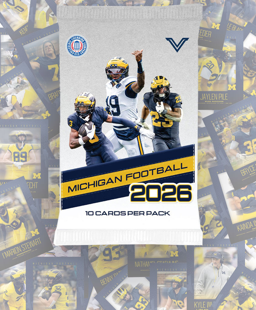 A Michigan Football 2026 10-card pack booster pack centered over a collage background of football trading cards. The pack features photos of three Michigan football players and bold yellow and navy text reading 'MICHIGAN FOOTBALL 2026' with '10 CARDS PER PACK' below.