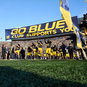 M Club Supports You Banner Touch + Full-Game Sideline Access (Saturday 11/7) — 2 Guests vs. MSU